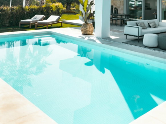 white concrete building with swimming pool